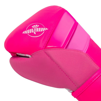 Pink boxing glove with a brand logo on a white background