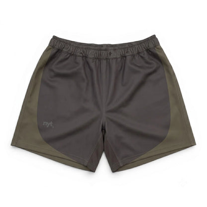Two-tone shorts with a dark gray front and green sides on a white background